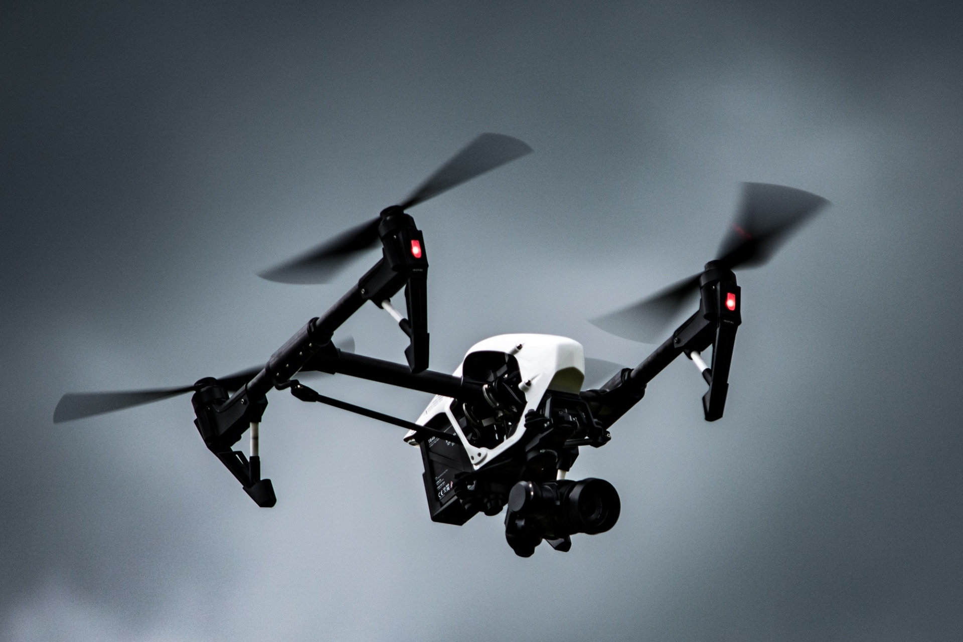 Professional survey drone in flight over a UK motorway